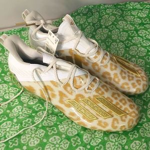 White and gold Adidas cleats